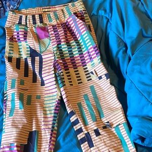 Womenswear pants size 15/32 and the color  is green,yellow,black,and pink